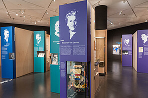 Biographies for Great Britain, France, and the Netherlands hang next each other, exhibition 